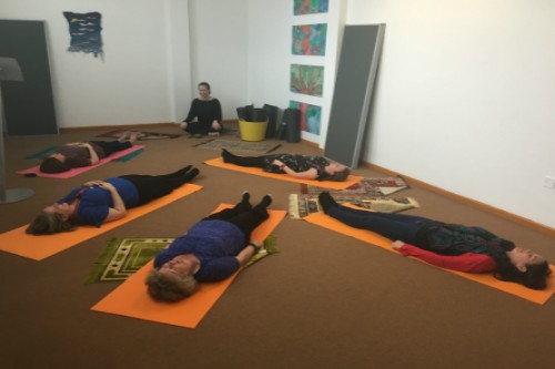 Employees participating in a mindfulness session 