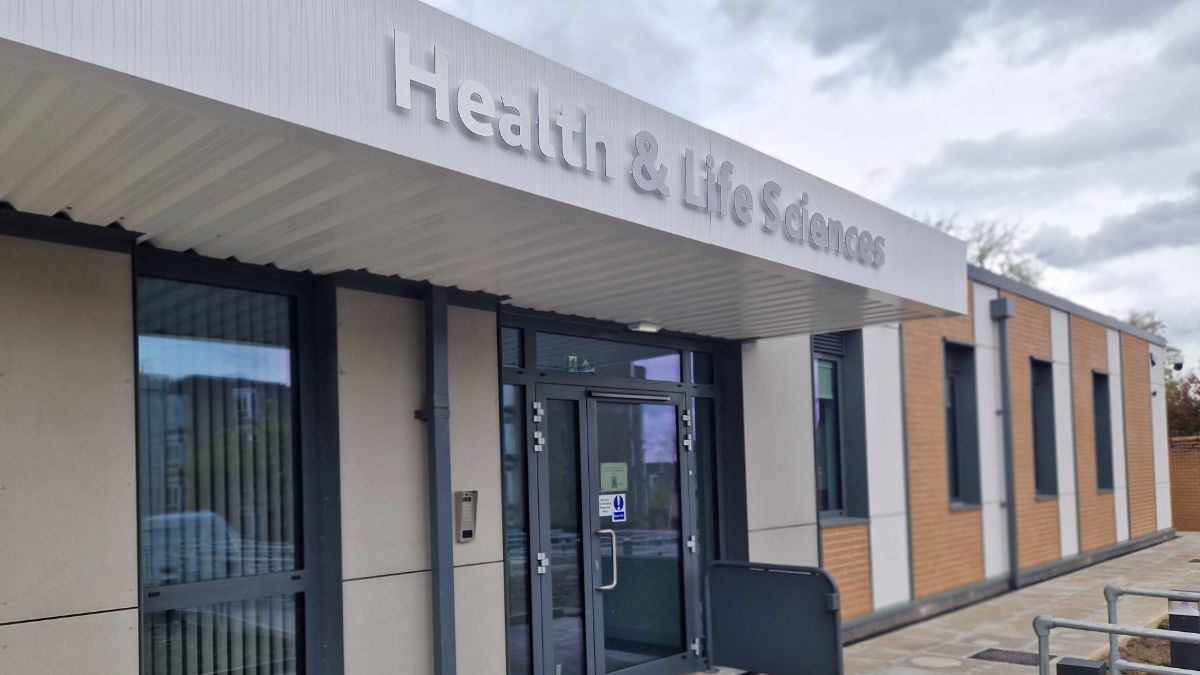 A picture of the main entrance to the Health and Life Sciences building