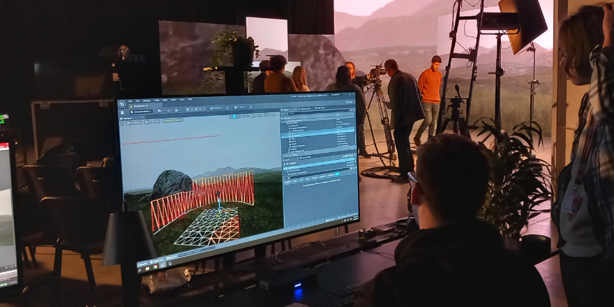 Students working in virtual production film studio