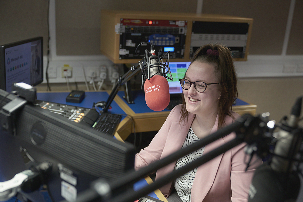 Journalism student records in the radio studio
